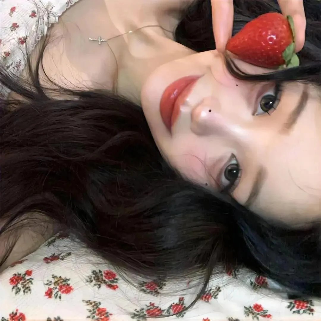 彼女